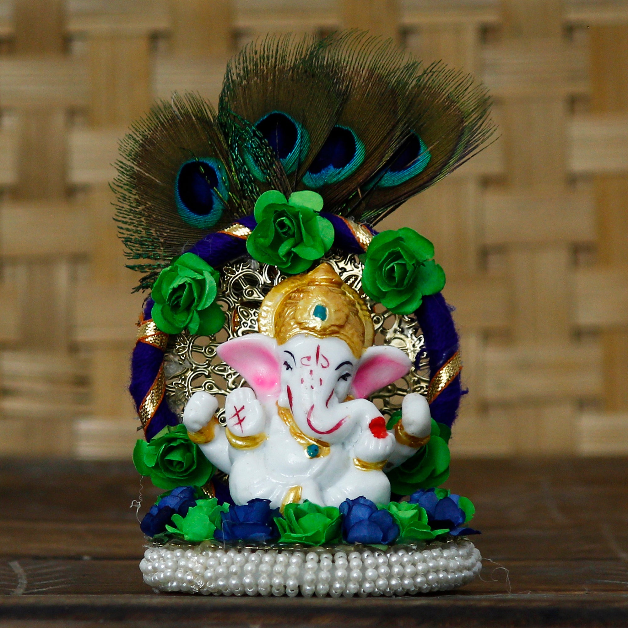 Lord Ganesha Idol on Decorative Handcrafted Floral Plate with Peacock Feather for Home and Car